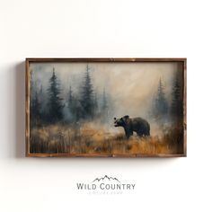 a painting of a bear in a field with trees behind it and the words wild country above it