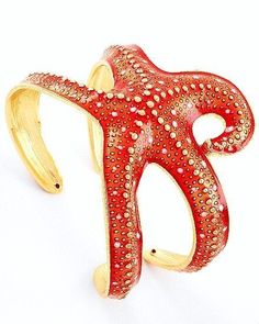 Here is a Very  Comfortable  Adjustable Starfish  Cuff  Bangle Bracelet  Coral Red  and Gold Tone .This Bracelet will  comfortably fit any size wrist  . It looks great and  goes with any outfit . The Size of starfish is about 2 1/5 inches.     This bracelet comes in a Gift Box perfect for Gift Giving. I ship by Expedited mail  ( delivery 3-5 days).   Thank You for looking ! Elegant Red Metal Cuff Bracelet, Adjustable Red Bangle Cuff Bracelet, Trendy Red Bracelets For Party, Unique Red Cuff Bangle Bracelet, Unique Red Bangle Cuff Bracelet, Elegant Red Cuff Bracelet For Formal Occasions, Adjustable Red Formal Jewelry, Adjustable Red Cuff Bracelet As Gift, Coral Bangle Bracelet As Gift