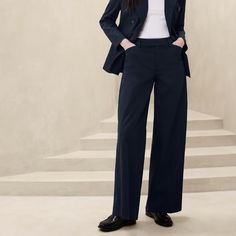 Brand New With Tags. Banana Republic Factory Stretch-Cotton Icon Trouser Size 8. Mid Rise. Full Length. Wide Leg. Icon Collection: The Icon Suit Collection Makes Sophistication Look Easy With Its Structured On-Trend Fit And Stretch Cotton Designed To Match Your Every Move. Wear Back With Our Best-Selling Icon Blazer, Now In Stretch Cotton. Full Length. Hook-And-Bar Closure With Zip Fly. Belt Loops. Welt Front And Back Pockets. Back Waist Darts. Trouser Crease. Made Exclusively For Banana Republi Suit Collection, Icon Collection, Banana Republic Factory, Navy Color, Stretch Cotton, Fabric Care, Banana Republic, Pant Jumpsuit, Mid Rise