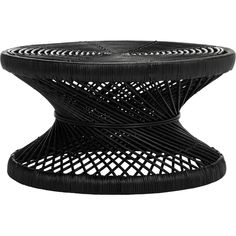 a black wicker table with an intricate design on the top and bottom, sitting in front of a white background