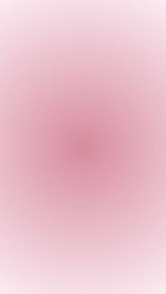 a pink and white background with an oval shape