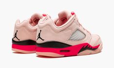 The Women’s Air Jordan 5 Low “Arctic Pink” is a women’s-exclusive colorway of the low-top silhouette from Jordan Brand’s Spring 2022 release cycle. The clean and casual design of the “Arctic Pink” colorway calls to mind the appearance of a Valentine’s Day-inspired look, and features a light pink leather upper with translucent netting on the side and on the tongue. A black Jumpman logo is embroidered on the heel and a red Jumpman is stitched onto the tongue. A clear lace cover and red lace toggle Womens Air Jordan, Original Air Jordans, Pretty Sneakers, Sneakers Box, Kobe Shoes, Nike Air Jordan 5, Womens Air Jordans, Nike Brand, Air Jordan 5