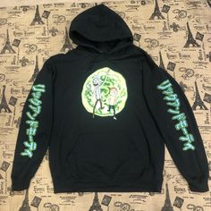 Rick And Morty Nwt! Trippy World Black Hoodie Sz S,M,L Rick And Morty Sweatshirt, Rick And Morty Merch, Rick And Morty Characters, Rick And Morty, Hooded Pullover, Black Green, Pullover Sweatshirt, Piece Of Clothing, Black Hoodie