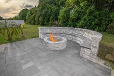 a fire pit sitting on top of a stone patio