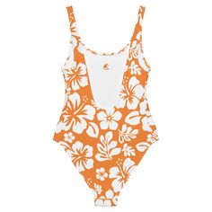 Live your best beach life in our White Hawaiian Flowers on Orange One-Piece Swimsuit. With a beautiful floral print and flattering fit, this swimsuit is perfect for all shapes and sizes. The silky smooth material will have you feeling the Aloha love while you chill at the beach or pool. Now that's something to be Extremely Stoked about! • 82% Polyester, 18% Spandex • Chlorine-resistant fabric • Cheeky fit with a scoop neckline and a low scoop back • Zig-zag stitching • Double-layer front • Four- Orange One Piece, White Swimsuit, Hawaiian Flowers, Scoop Neckline, Live For Yourself, Beach Life, One Piece Swimsuit, Floral Prints, How Are You Feeling