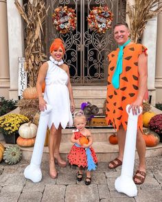 two women and a child dressed up in costumes