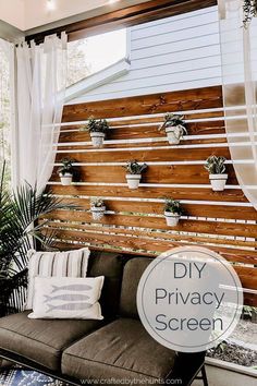 an outdoor privacy screen with potted plants on it and the words diy privacy screen