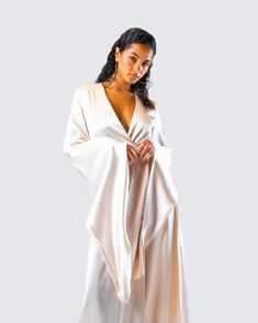 She’s boujee or whateva 👑 Made from satin fabric and complete with a tie belt and oversized bell sleeves, this robe will make you feel like a million bucks - even when you’re just lounging around 👏 Black Off Shoulder, Graphic Top, Satin Maxi, White Jersey, Pocket Pants, White Mini Dress, Tie Belt, Satin Fabric, Make You Feel