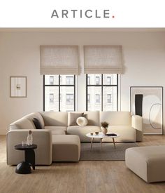 a living room filled with furniture and windows covered in shades of light brown, beige and white