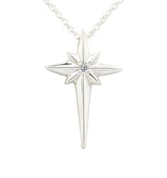 "The faceted design of this beautiful necklace reminds us of bright star in the sky that was a sign of Christs birth. This pendant, set with a .02 ct diamond in the center, reminds us of this sign from heaven. Sterling Silver, 7/8\" tall. Hangs on an 18\" Sterling Silver cable chain with lobster clasp. Handmade in the US." Star-shaped Brilliant Cut Necklace, Star-shaped Brilliant Cut Necklace For Gift, Star-shaped Diamond White Necklace For Anniversary, Star-shaped Single Diamond Jewelry For Gifts, Star-shaped Single Diamond Jewelry Gift, Sterling Silver Star Necklace With Diamond Accents, Celestial Style Silver Diamond Necklace Gift, Celestial Silver Diamond Necklace Gift, Formal Star-shaped Single Diamond Jewelry