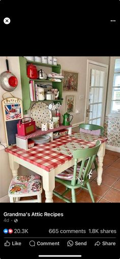 a kitchen table with chairs and a red checkered table cloth on it's top