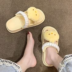 Features: Slip-on Casual Open toe Two wear Cartoon doll decor design Material: EVA Cartoon Style Open Toe Beach Sandals, Cartoon Style Sandals For Beach And Summer, Cartoon Style Sandals For Beach In Summer, Cute Closed Toe Summer Slippers, Cartoon Style Summer Beach Sandals, Playful Open Toe Slippers For Spring, Fun Open Toe Slippers For Spring, Cute Eva Open Toe Sandals, Cute Yellow Open Toe Sandals