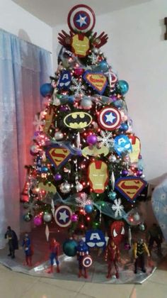 a christmas tree decorated with avengers ornaments