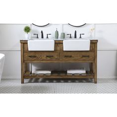 two sinks are shown in front of a mirror and white tile floored bathroom walls