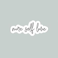 the word more self love written in black ink on a light gray background with white clouds