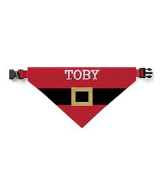 a red and black dog bandana with the words tobby on it