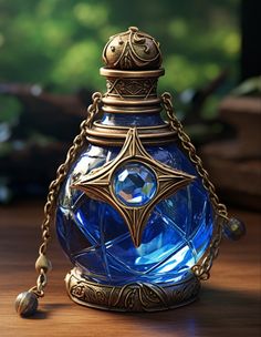 a blue glass perfume bottle sitting on top of a wooden table