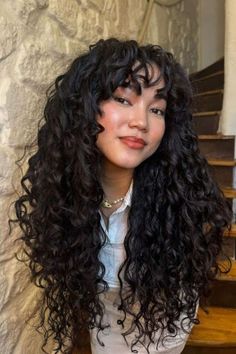 Frizzy Curly Hair Styles, Long Curls With Bangs, Long Curly Hair Round Face, Ashy Brown Curly Hair, Curly Hair Women Aesthetic, Curly Butterfly Cut, Curly Hair Cuts With Bangs, Long Curly Hair With Bangs And Layers, Long Black Curls