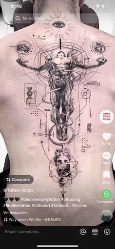 the back of a man's body with tattoos on it and an image of jesus