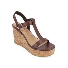 Journee Collection-Matildaa Platform Wedge Sandal Refresh your closet with the Journee Collection Matildaa platform wedge sandal. Made of synthetic for a rich look, this square open toe sandal is designed with T-strap for a sporty touch, faux cork wedge heel to offer a blend of old-world charm and comfort, and 4 mm Tru Comfort Foam footbed for soft comfort. Brown Wedge Sandals, Fashion Shoes Sandals, Comfy Sandals, Sandals Brown, Cork Wedges Sandals, Womens Sandals Wedges, Open Toed Heels, Buckle Shoes, Famous Footwear