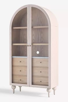 an arch - shaped cabinet with drawers is shown in white and light wood, as well as the top shelf