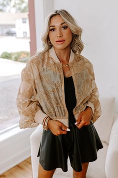 - This velvet burnout bomber jacket is the ultimate blend of luxe style and laid-back vibes. With its chic floral design and rich texture, it's the statement piece your wardrobe has been waiting for. Embrace main character energy with this trendy piece! - Unlined velvet burnout material with a floral pattern - A knit collar - A zip closure front - Long, loose sleeves with fitted knit cuffs - A relaxed silhouette that ends in a knit waistband Luxury Embellished Outerwear For Spring, Luxury Studded Outerwear For Spring, Luxury Beige Bohemian Outerwear, Luxury Frayed Hem Outerwear For Fall, Boutique Clothing Impressions Online Boutique, Main Character Energy, Velvet Burnout, Luxe Style, Loose Sleeves