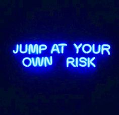 a neon sign that says jump at your own risk