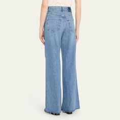 AMO Denim "Frida" wide-leg jeans featuring a frayed hem in medium-wash denim  Approx. 12" rise; 31.5" inseam High rise Five-pocket style Easy, relaxed fit Full length Button/zip fly; belt loops Cotton Made in USA Medium Wash Wide Leg Flare Jeans In Rigid Denim, Medium Wash Flare Jeans With Frayed Hem, Medium Wash Wide Leg Rigid Denim Jeans, Full Length Rigid Denim Flare Jeans With Frayed Hem, Relaxed Fit Flare Jeans With Frayed Hem, Cocktail Jacket, Lingerie Sleepwear, Handbags On Sale, Formal Wear