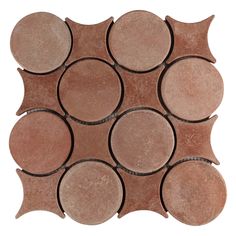 a brown and tan tile with circles on the bottom, one circle is in the middle