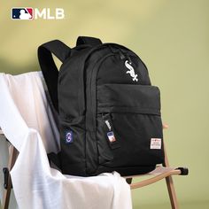 MLB OFFICIAL BASEBALL BACKPACK Light weight backpack , suitable for sports events, school, travelling and daily use. Made of waterproof polyester, this backpack has: Embroidered Sox logo Exterior front zipper pocket 2 main zippered compartments 2 side pockets Top carry handle (3.5") Front main compartment with organizer pockets Padded laptop compartment Quality construction, fully padded back panel and shoulder straps for cushioned comfort 14"" x 6" x 18" Baseball Backpack, Embroidered Socks, Light Backpack, Lightweight Backpack, Pocket Top, White Sock, Men's Backpack, Chicago White Sox, Navy And Green