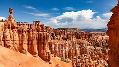 the hoodoos and towers of canyons are all in one area, with blue skies above them