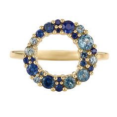 The Bubble multicolor sapphire ring is hand crafted in our studio from 18K gold and bursting with movement. Sapphires in varied hues of blue and teal are arranged in an asymmetrical circle that leaves space in the center for a peek of skin. This ring adds a refreshing yet calming touch of color to any collection. MATERIALS  18k solid gold | Sapphire Total sapphire carat weight: ~0.95ct Band's width: 2.10mm  Please note - each sapphire is OOAK and will vary in its shade/color.  Information about Rings Opal, Wedding Ring Sets Unique, Saphir Ring, Ring Luxury, Blue Ring, Football Coach, Rock Punk, Silver Circle, Deco Engagement Ring