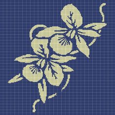 a cross stitch pattern with white flowers on a blue background