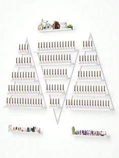 About this item

[Premium Golden Display Rack]: Kalolary metal cosmetic display racks include 3 5-layer triangle holders and 3 horizontal bars, which make your nail polish neatly displayed and clearly visible so that you can find the style you want quickly.

[Sturdy Storage Shelf]: The surface of these white storage racks are painted at high temperature, very sturdy and not easy to rust or lose paint, with strong load-bearing capacity and stable structure, can be used for a long time.

[Large Ca Perfume Wall, Essential Oils Organization, Iron Storage, Nail Polish Storage, Cosmetic Display, Storage Racks, White Storage, Makeup Bag Organization, Display Cases