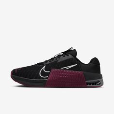 the nike zoom low is available in black, purple and white with a red sole