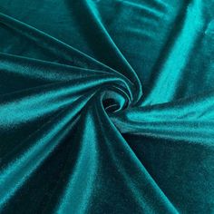 a close up shot of the fabric in teal green, which is very soft