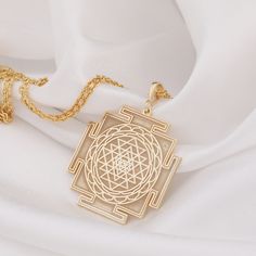 14 K Solid Gold Sriyantra Necklace, Sri yantra Charm Necklace, Hindu jewelry , Gold Mandala Necklace, Sri Charka Necklace  * Gender : Male / Female * Material : Solid Gold and 925 Sterling Silver  * If you prefer a 14k solid gold, we will send a 40 cm 14 carat gold chain weighing 1-1.5 grams. * If you prefer a Silver necklace, we will send you a 50cm silver chain.  * If you prefer a 14k solid gold with triple chains, we will send you the lengths of 37/45/50cm that are presented in the models.  * If you prefer a sterling silver necklace with triple chains, we will send you 37/45/50cm Silver chain.  * 3-piece chain length is standard and suitable for all women        * Visit our shop for more items   https://luminousluxurycrafts.etsy.com    ✔ Ready to Ship in 1-2 Business Days ✔ Free shippin Hindu Jewelry, Schmuck Gold, Mandala Necklace, Sri Yantra, Gold Mandala, Gold Locket, Jewellery Sets, Jewelry Lookbook, Bridal Gold Jewellery