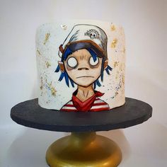 a white cake with a cartoon character on it