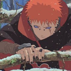 an anime character with red hair and blue eyes is holding a branch in the snow