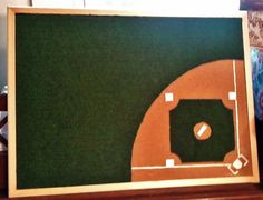 an image of a baseball field in the middle of a room with green grass and wood