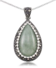 The large green teardrop jade evokes a peaceful serenity to those who gaze upon it. Meticulous bead work frames this opaque stone in the brilliance of high polished sterling silver. Genuine marcasite covers the entire bale and body of this spiritual pendant. Macy's Teardrop Jewelry For Gift, Princess Cut Diamond Earrings, Thick Gold Chain, Fake Diamond, Jewelry Design Inspiration, Jewelry Tags, Popular Jewelry, Teardrop Pendant, Celtic Jewelry