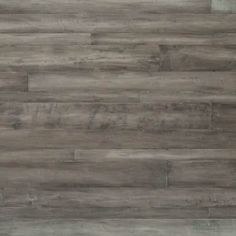 an image of a wood floor that looks like it has been painted in grey tones