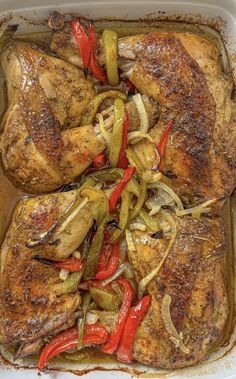 chicken with peppers and onions in a casserole dish