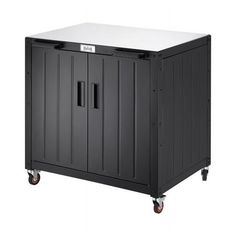 a black and white storage cabinet on wheels