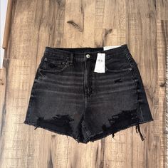 Never Worn. Size 6. Washed Black Color 90s Black Summer Shorts, Black 90s Style Summer Shorts, Relaxed Fit Cutoff Grunge Shorts, 90s High Waist Relaxed Fit Shorts, High Rise Relaxed Fit Grunge Bottoms, High-rise Relaxed Fit Grunge Bottoms, High Rise Fitted Grunge Shorts, Fitted High-rise Grunge Shorts, Grunge High Rise Fitted Shorts