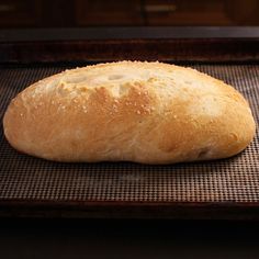 a loaf of bread sitting on top of a pan