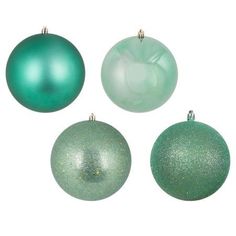 three green ornaments are shown against a white background