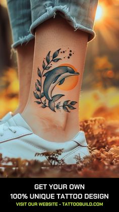 a woman's foot with a dolphin tattoo on it and the words get your own 100