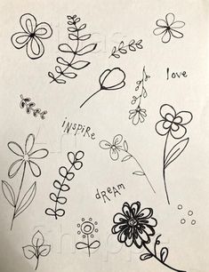 some flowers are drawn in black ink on white paper with the words love written below them