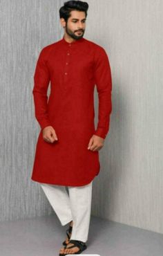 "HANDMADEKURTASHOP  Description Man kurta for Man Give yourself a best ethnic look by wearing this Top and bottom Set. Made of rich cotton silk blend fabric this regular-fit set comprises a full-sleeved Indian kurta pajama This outfit with mojris will look apart on special occasions. material 100%Cotton Color : Red color Kurta Length : 40 inches Shirt Chest is measurement for shirt (not body) As per standard, for best loose fitting 6 inches gap should be there between actual chest size and shirt chest size Size chart is below Men's Sizes Actual Body Chest - Ready Shirt Chest i Add 6\" Inches Lose Fitting Fabric Armhole To Armhole. XS - 30\" Inches 36\" Inches S - 34\" Inches 40\" Inches M - 36\" Inche 42\" Inches L - 40\" Inches 46\" Inches XL - 44\" Inches 50\" Inches 2XL - 48\" Inches 54 Simple Kurta Pajama For Men, Red Straight Kurta With Pallu, Red Long Sleeve Traditional Wear For Puja, Red Kurta For Diwali, Red Cotton Sherwani For Festivals, Red Cotton Sherwani For Diwali, Red Cotton Sherwani For Navratri, Festival Red Cotton Sherwani, Traditional Solid Cotton Kurta